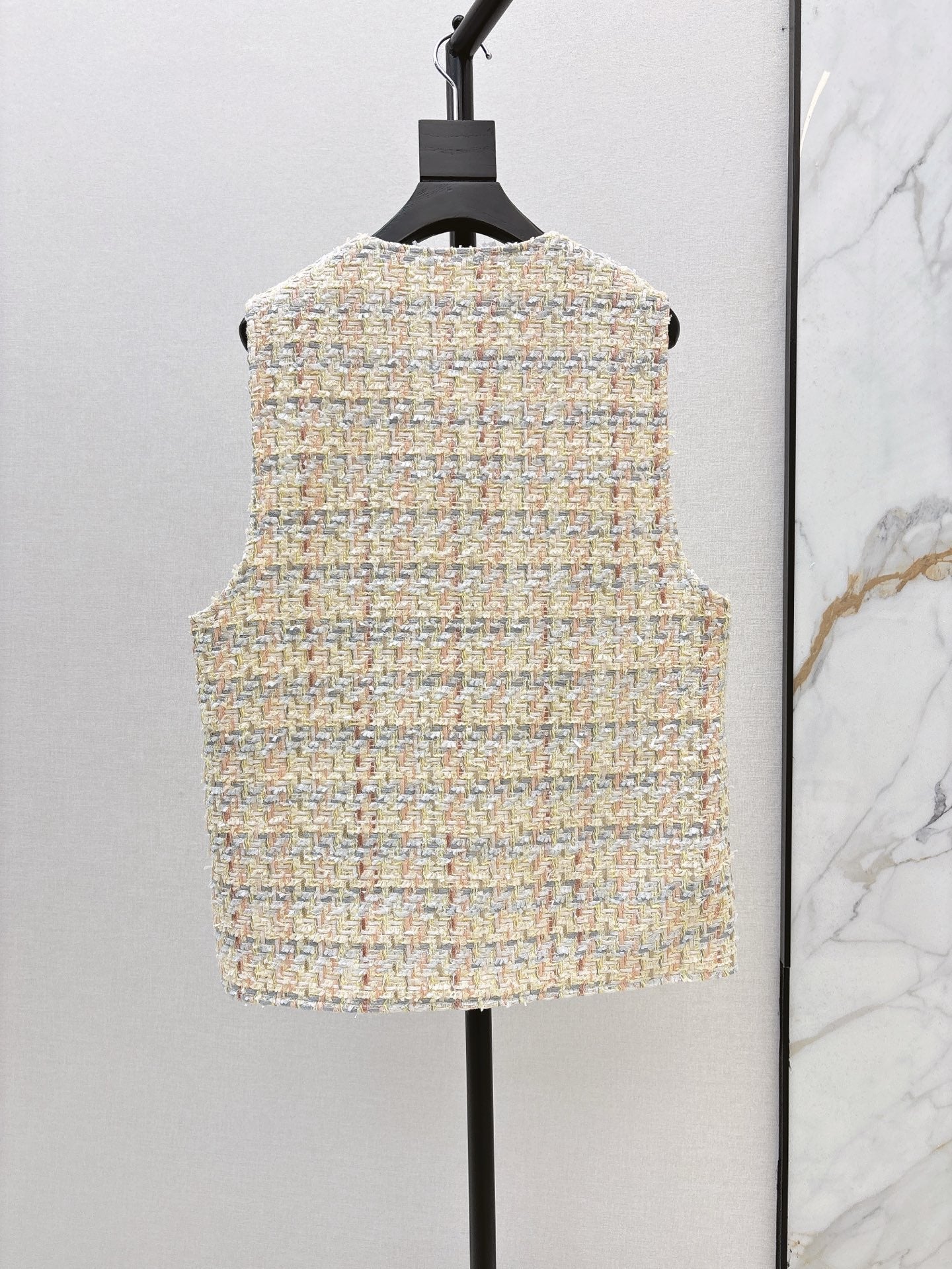 ch 25ss woven vest