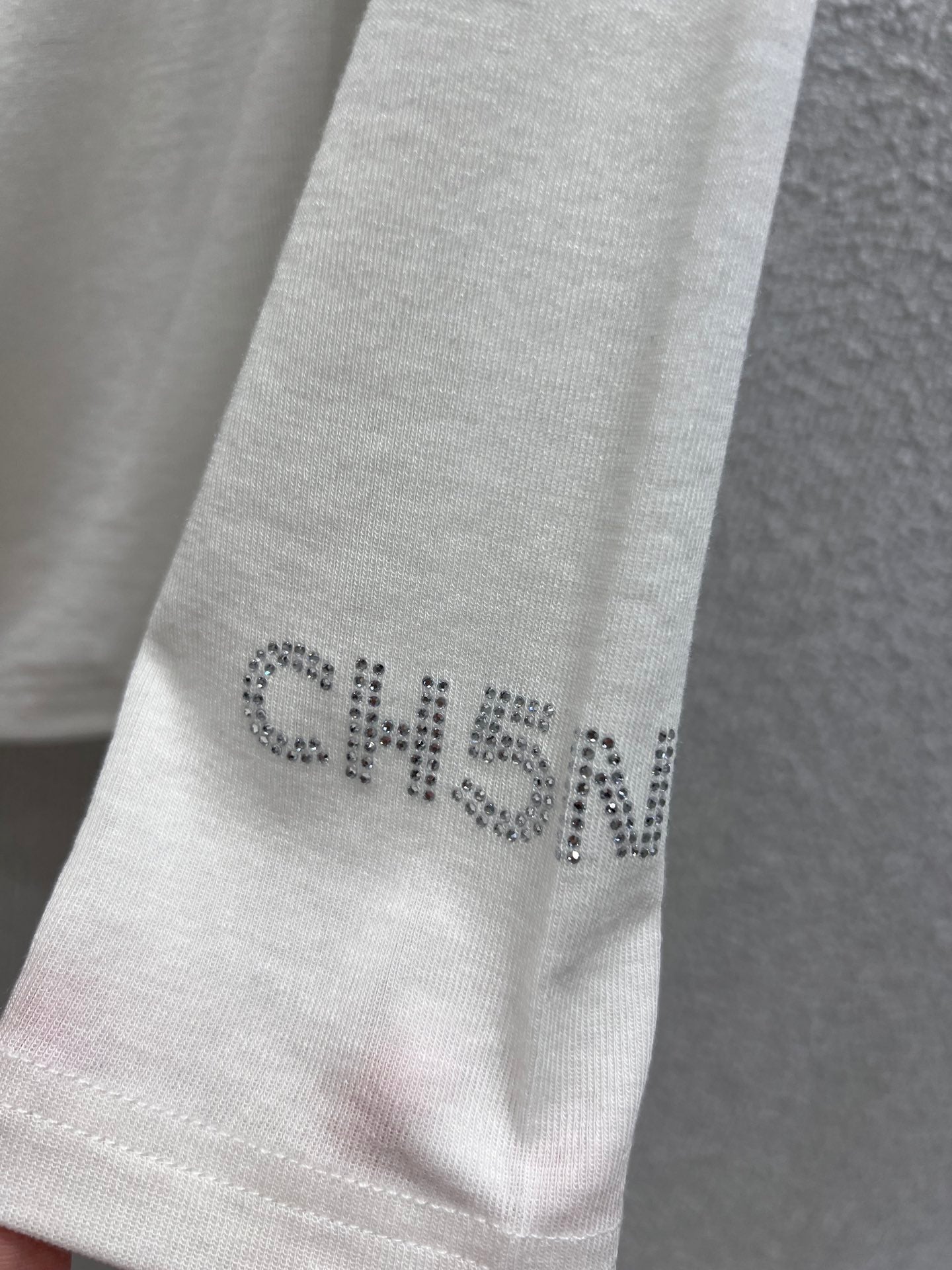 Chan 25fw off-shoulder top