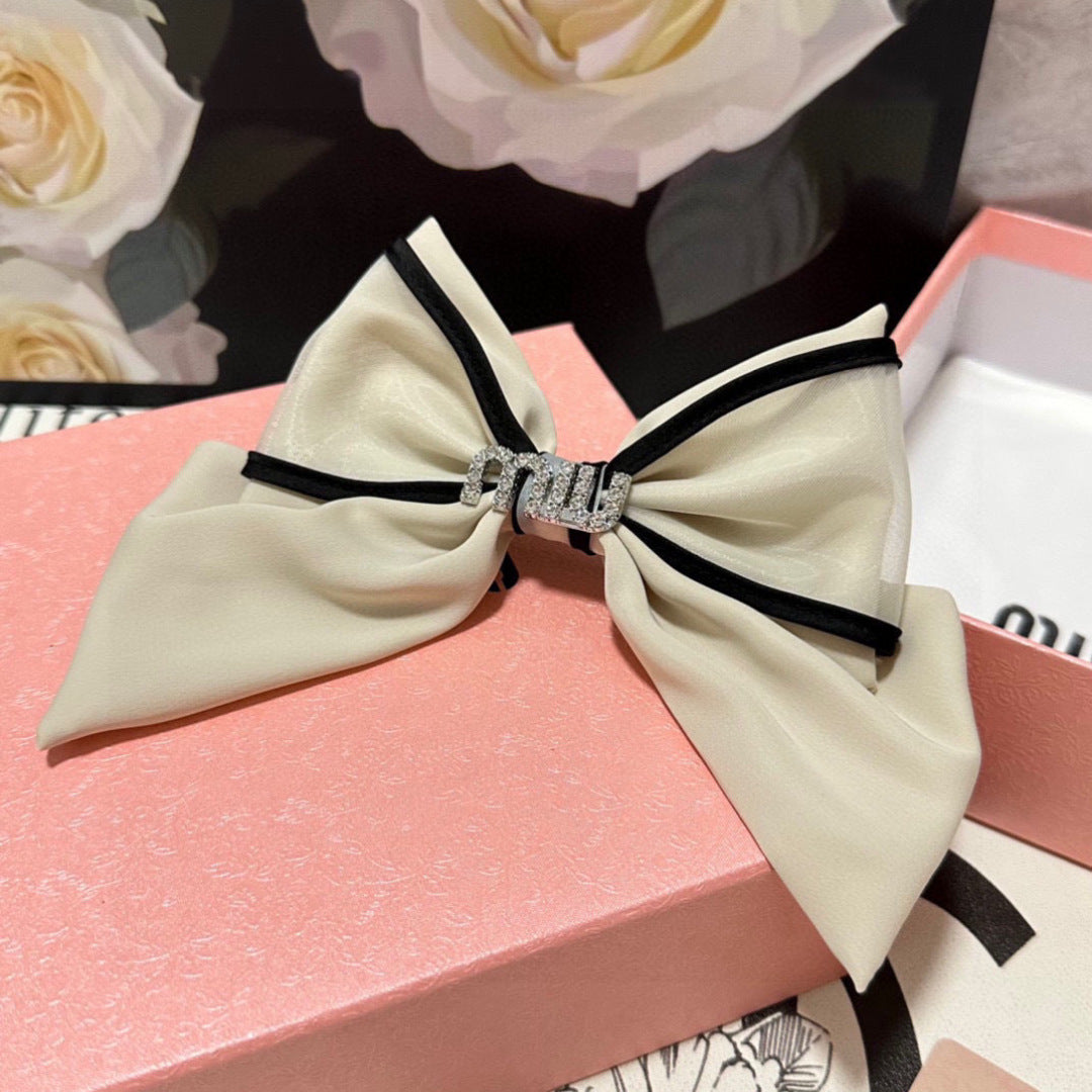MI BOW HAIR CLIPS