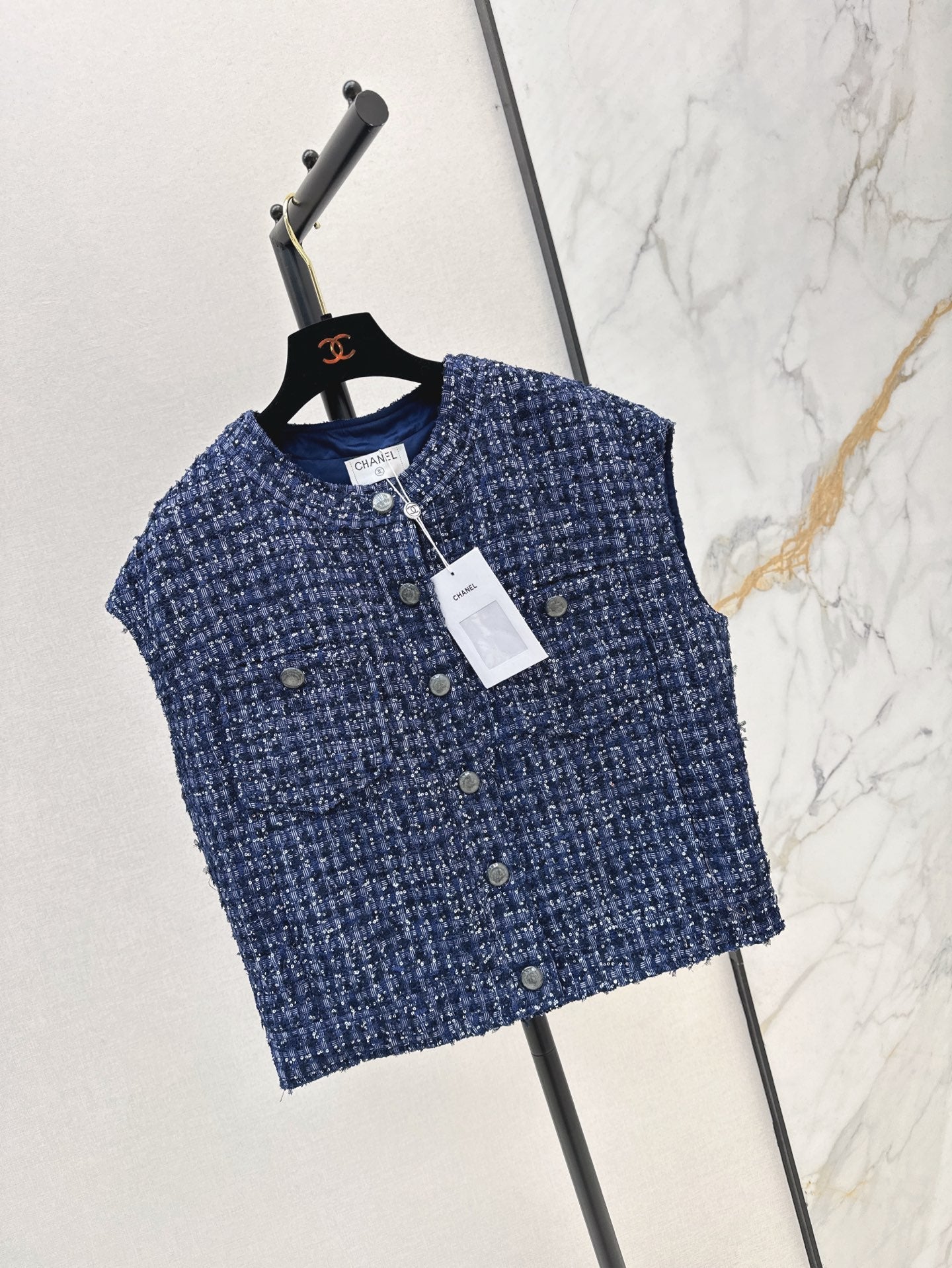 ch 25ss woven vest