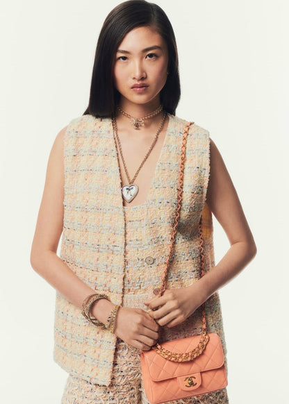 ch 25ss woven vest