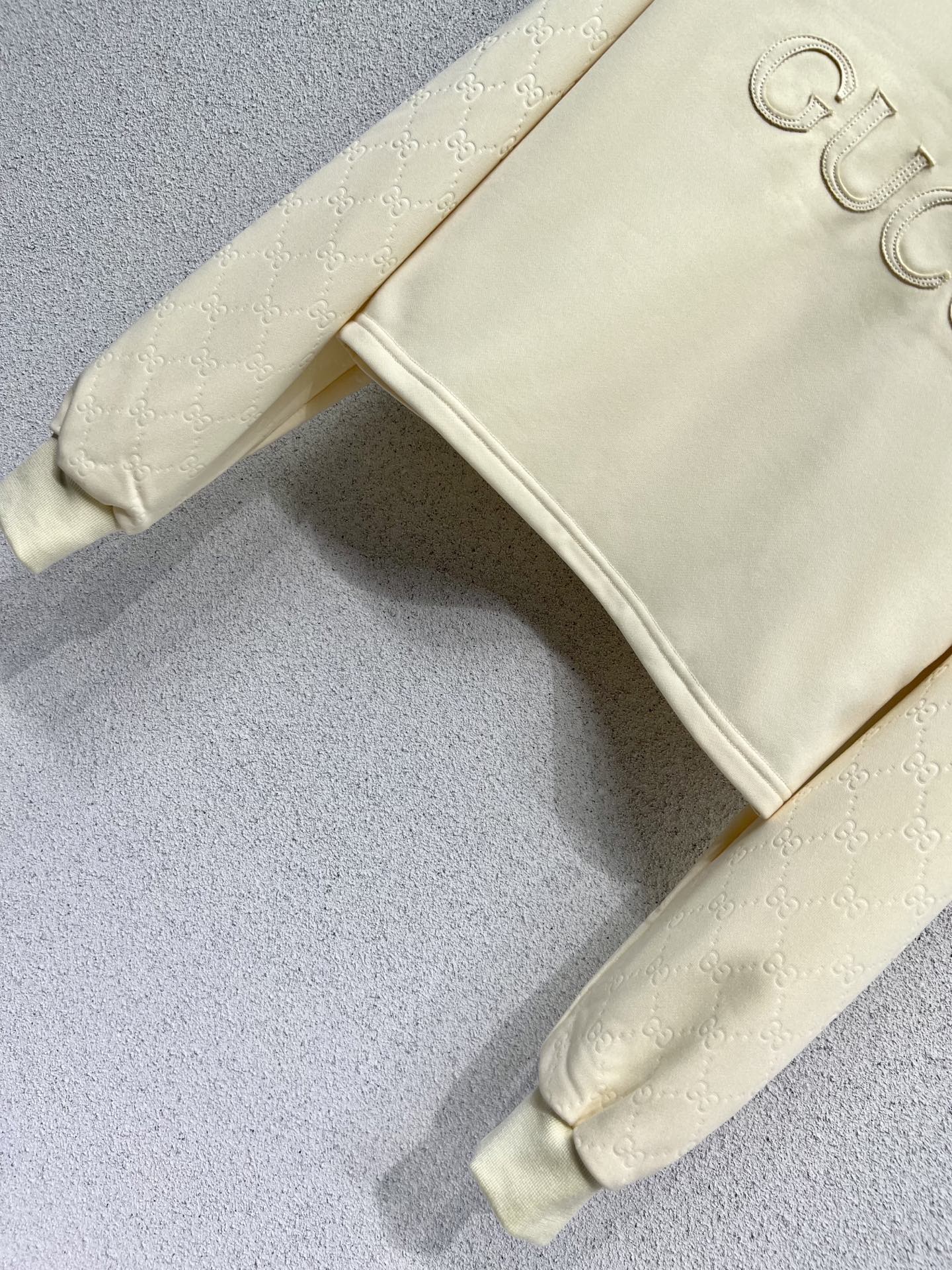 Guc 25fw embossed tracksuit